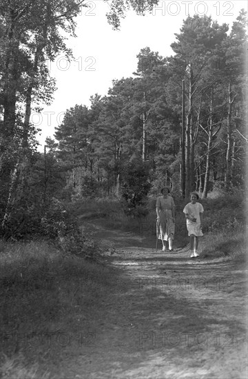 A mother and daughter walking in the forest, Skälderviken, Sweden, 1920s. Artist: Unknown
