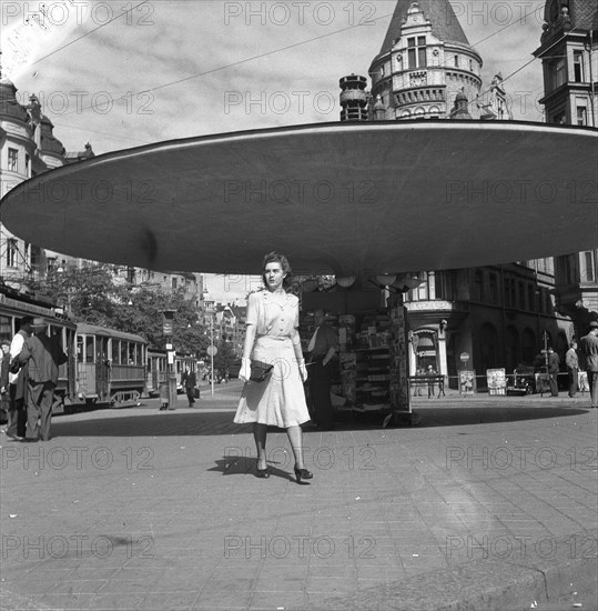 Woman walking in the Stureplan square, Stockholm, Sweden, 24th July 1943. Artist: Karl Sandels