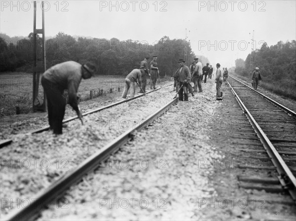 Navvies strengthen the railway between Stockholm and Malmö, Sweden, 1930s. Artist: Karl Sandels