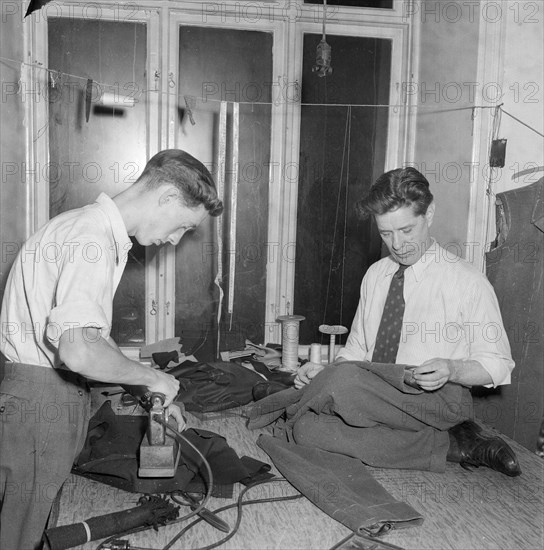 Tailors sewing and ironing, Landskrona, Sweden 1952. Artist: Unknown