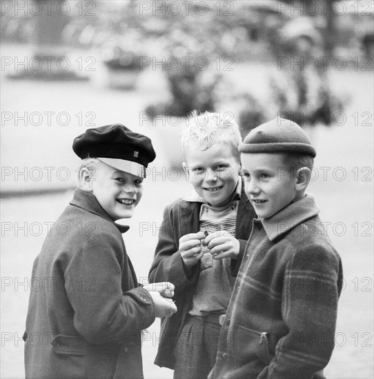 Three mischievous boys playing with fulminating powder, Landskrona, Sweden. Artist: Unknown