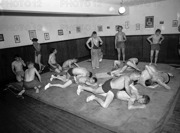 Argos, the wrestling Club of Landskrona, Sweden, in training, 1954 Artist: Unknown