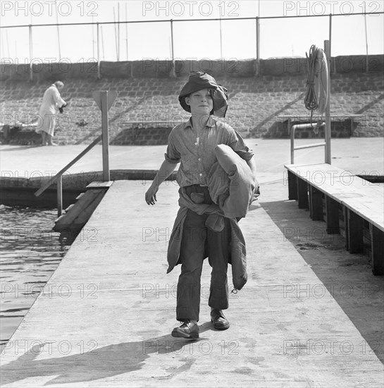 A boy on the jetty, Borstahusen, Landskrona, Sweden, 1964. Artist: Unknown