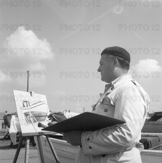 An artist painting in the harbour of Borstahusen, Landskrona, Sweden, 1952. Artist: Unknown