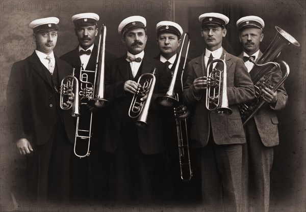 Amorosa, musical sextet, with their brass instruments, Landskrona, Sweden, 1910. Artist: Unknown