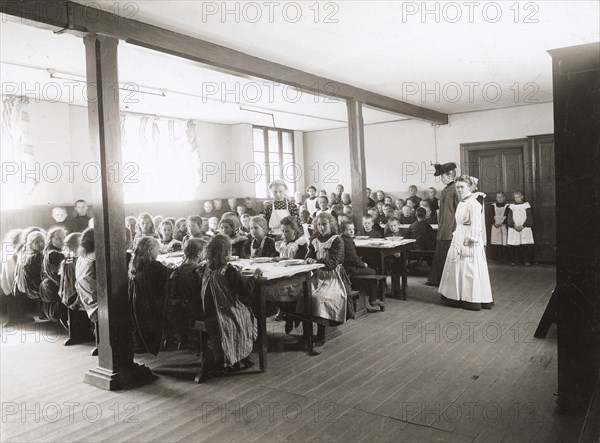 Poor children are served free meals in the refectory, Albano school, Landskrona, Sweden, 1906. Artist: Unknown