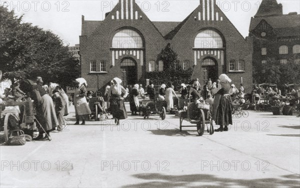 Market trade in the square of Landskrona, Sweden, 1930. Artist: Unknown