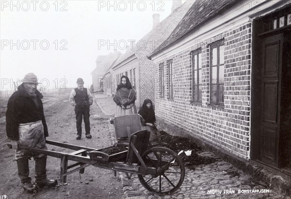 Fisherman with his wheelbarrow, Borstahusen, Landskrona, Sweden, c1900. Artist: Unknown