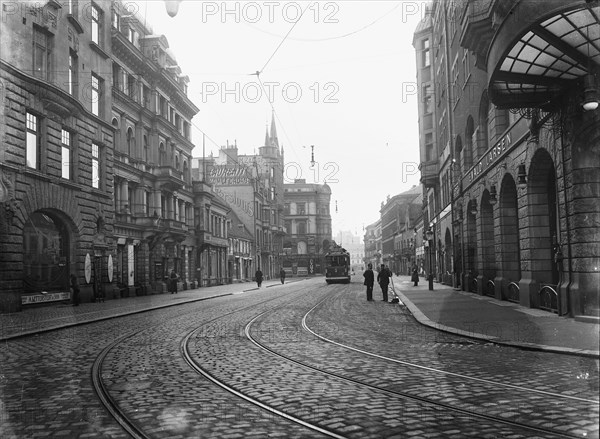 Tram on a street in Malmö, Sweden, c1920. Artist: Unknown