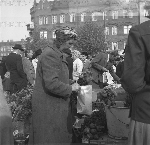 Fruit and vegetable stall in the market, Malmö, Sweden, 1947. Artist: Otto Ohm