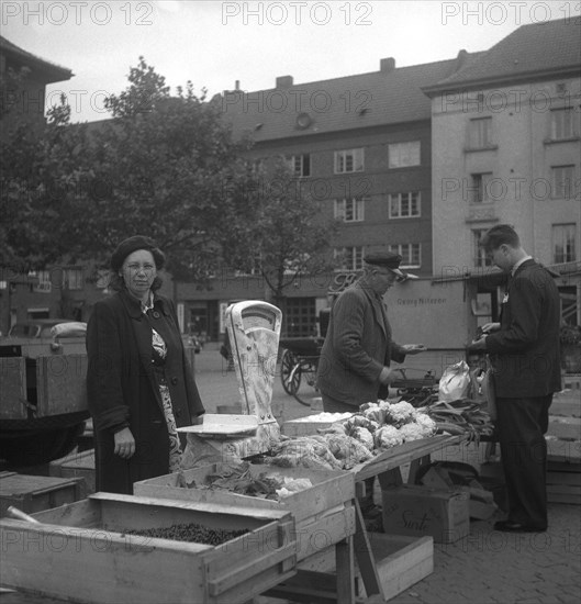 Fruit and vegetable stall in the market, Malmö, Sweden, 1947. Artist: Otto Ohm