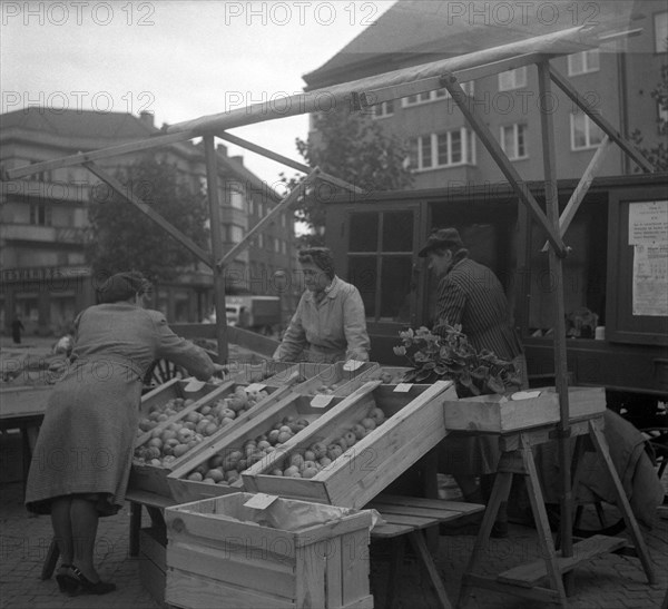 Fruit and vegetable stall in the market, Malmö, Sweden, 1947. Artist: Otto Ohm