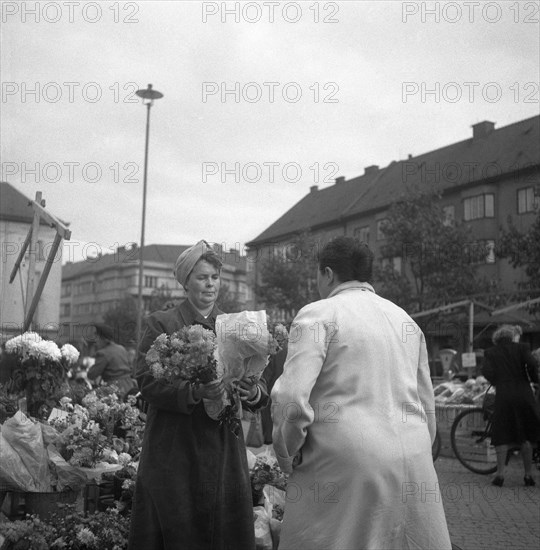 Flower stall in the market, Malmö, Sweden, 1947. Artist: Otto Ohm