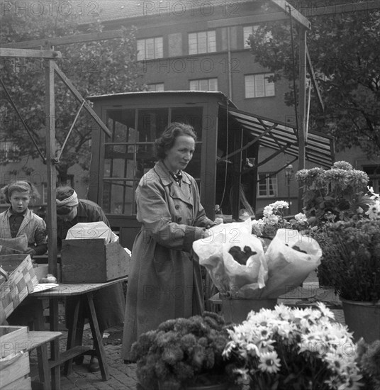 Flower stall in the market, Malmö, Sweden, 1947. Artist: Otto Ohm