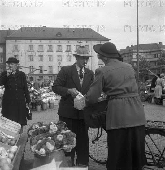 Scene in the market, Malmö, Sweden, 1947. Artist: Otto Ohm