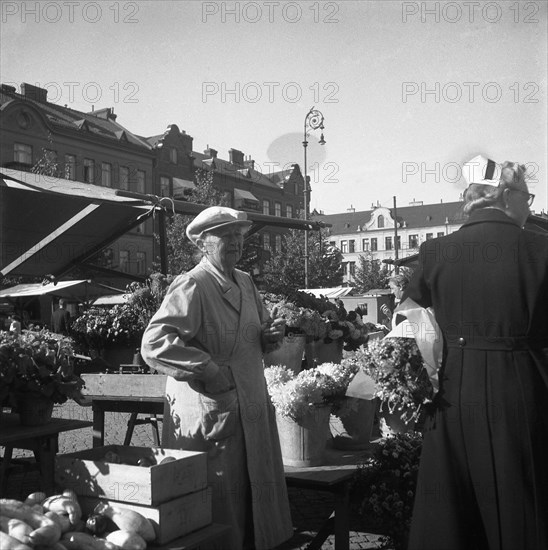 Flower stall in the market, Malmö, Sweden, 1947. Artist: Otto Ohm