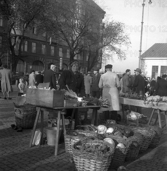 Fruit and vegetable stall in the market, Malmö, Sweden, 1947. Artist: Otto Ohm