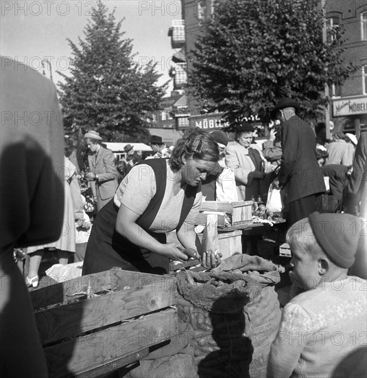 Fruit and vegetable stall in the market, Malmö, Sweden, 1947. Artist: Otto Ohm