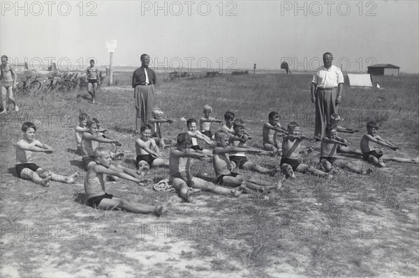 Boys doing exercises before having a swimming lesson, Sweden, 1939. Artist: Otto Ohm