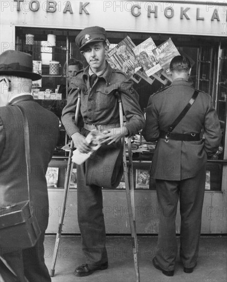 A disabled WWII Allied POW on his way home, Trelleborg railway station, Sweden, 1943. Artist: Unknown