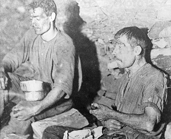 Miners enjoying a snack in the Brinsley Colliery pit, Nottinghamshire, 1913. Artist: Rev FW Cobb