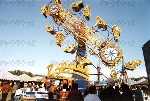 The 'Zipper' ride, Goose Fair, Forest Recreation Ground, Nottingham, Nottinghamshire, 1985. Artist: Reg Baker