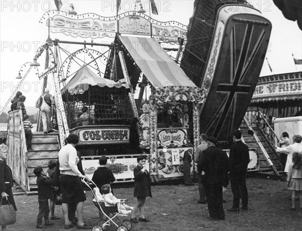 Harry Lee's 'Steam Yachts' swingboat ride, Goose Fair, Nottingham, Nottinghamshire, 1968. Artist: George L Roberts