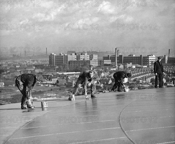 Workmen painting the top of Radford Gasometer, Nottingham, Nottinghamshire, c1949. Artist: Edgar Lloyd