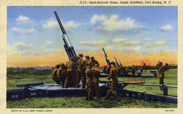 Anti-aircraft guns, Coast Artillery, Fort Bragg, North Carolina, USA, 1941. Artist: US Army Signal Corps