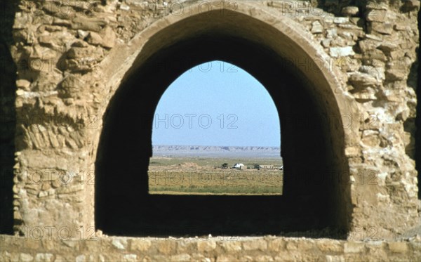 Looking out through an arch, fortress of Al Ukhaidir, Iraq, 1977.