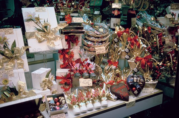 Christmas presents in a shop window, Paris, France.