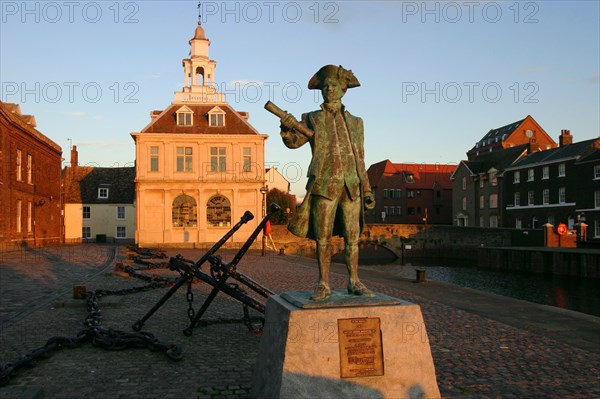 Statue of Captain Vancouver at dusk on the Purfleet Quay, King's Lynn, Norfolk.