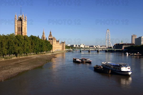 River Thames, Houses of Parliament and The London Eye, London.