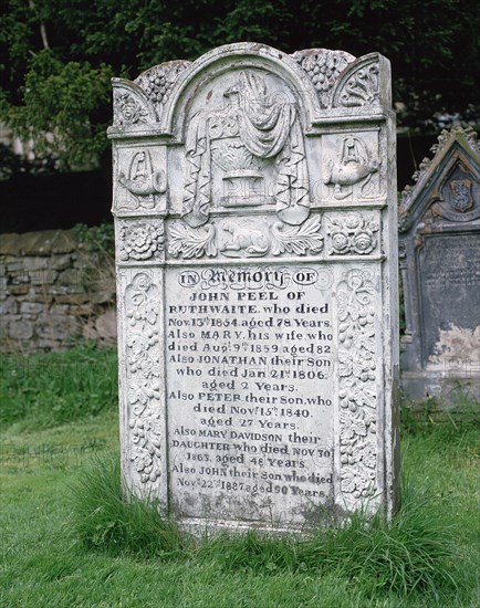 John Peel's gravestone, St Kentigern's parish churchyard, Caldbeck, Cumbria.