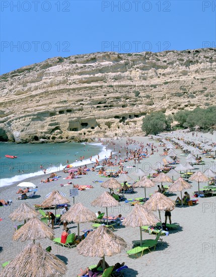 Beach and caves, Matala, Crete, Greece.