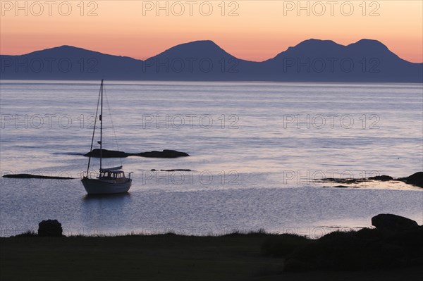 Sunset over Jura seen from Kintyre, Argyll and Bute, Scotland.