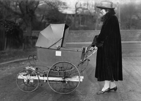 An electrically-powered perambulator, 1921. Artist: Unknown