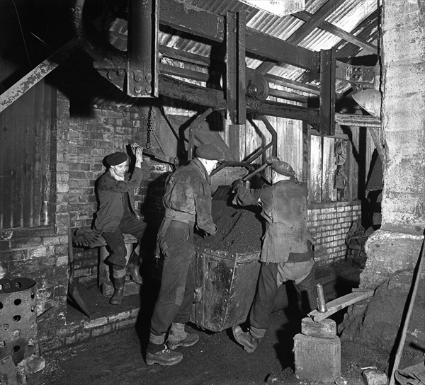 Miners working in Mitchell Main Colliery near Barnsley, South Yorkshire, 1956. Artist: Michael Walters