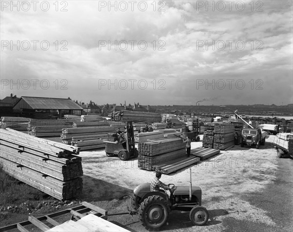 A busy timber yard, Bolton upon Dearne, South Yorkshire, 1960.  Artist: Michael Walters