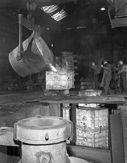 Teeming iron at Wombwell foundry, South Yorkshire, 1963. Artist: Michael Walters