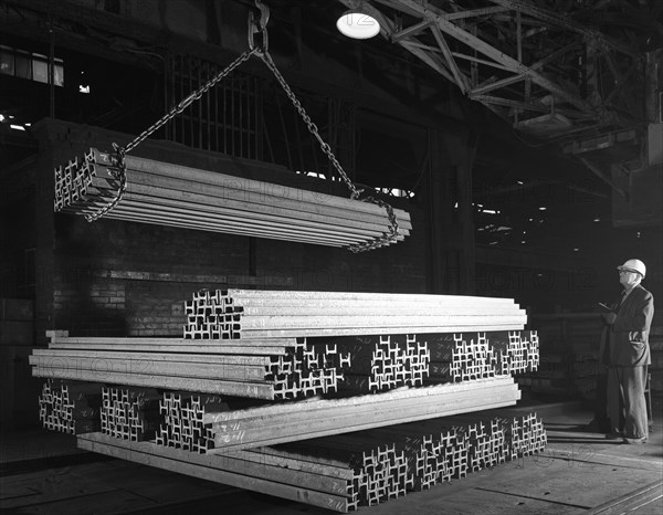 Steel 'H' girders being stacked for distribution, Park Gate, Rotherham, South Yorkshire, 1964. Artist: Michael Walters