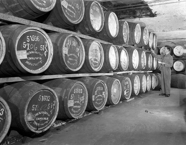 Whiskey blending at Wiley & Co, a Sheffield bonded warehouse, South Yorkshire, 1960. Artist: Michael Walters