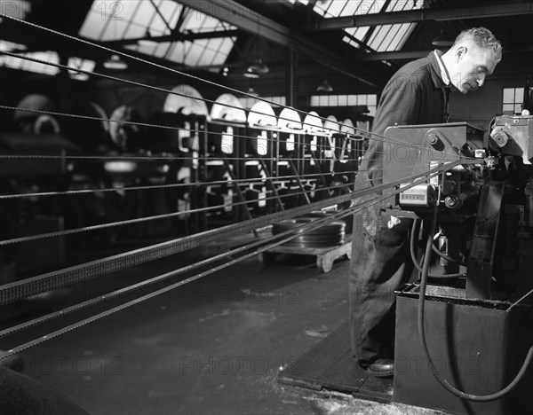 Bandsaws being sharpened at Slack Sellars & Co, Sheffield, South Yorkshire, 1963. Artist: Michael Walters