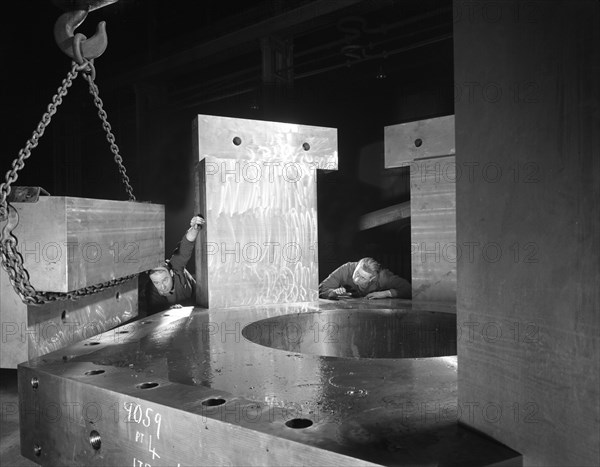 Inspecting a bubble chamber casting, Edgar Allen's steel foundry, Sheffield, South Yorkshire, 1964. Artist: Michael Walters