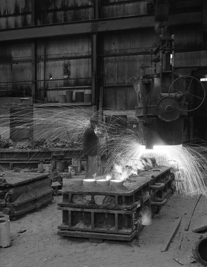 Casting a 1 in 14 rail crossing, Sheffield, South Yorkshire, 1964. Artist: Michael Walters