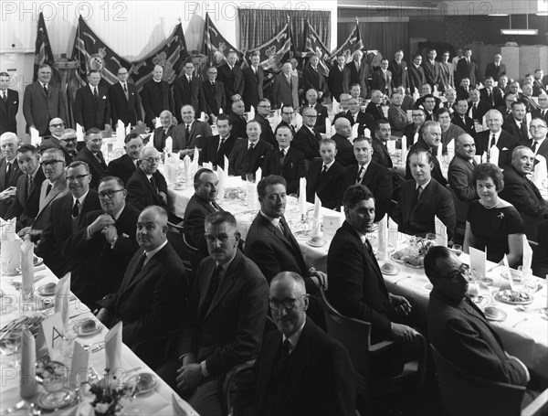 Members of the Royal Army Ordnance Corps (RAOC) gather for their annual dinner, 1965. Artist: Michael Walters