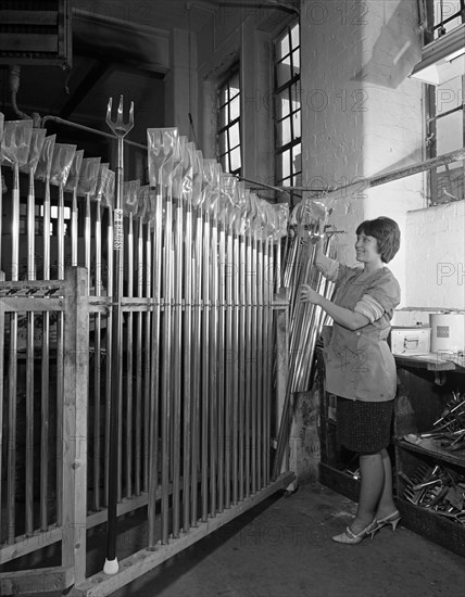 Packing garden forks for dispatch, Brades Tools, Sheffield, South Yorkshire, 1966. Artist: Michael Walters