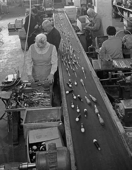 Assembling chisels and screwdrivers, Footprint Tools, Sheffield, 1968. Artist: Michael Walters