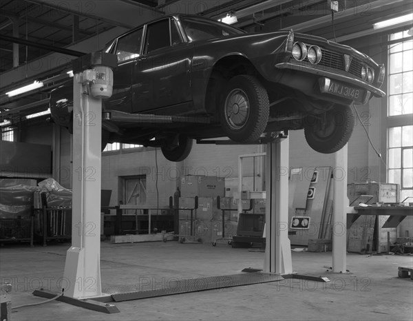 Rover P6 on a Laycock 4 post wheel free lift, Sheffield, South Yorkshire, 1968. Artist: Michael Walters