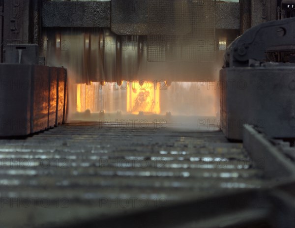 An ingot in a bloom mill, Park Gate Iron and Steel Company, Rotherham, South Yorkshire, 1966. Artist: Michael Walters